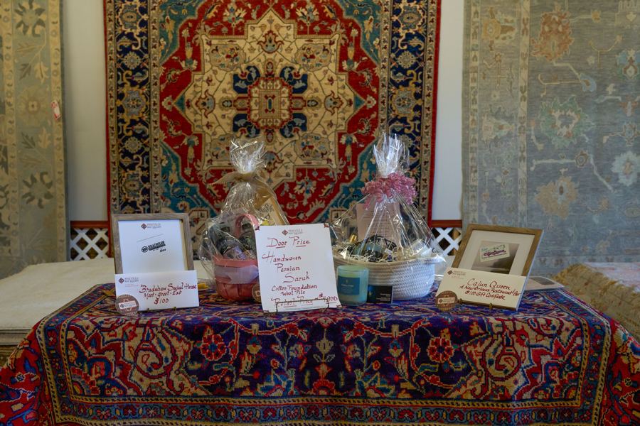 Anniversary welcome table with framed photos