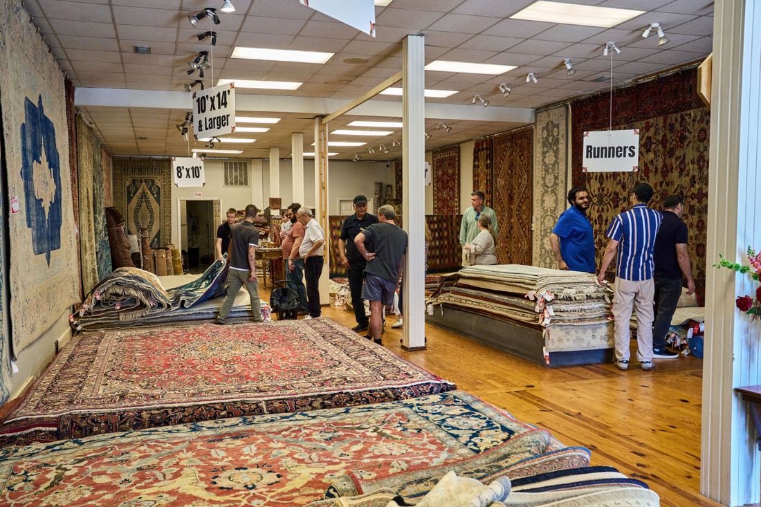 Guests exploring the gallery floor at the celebration