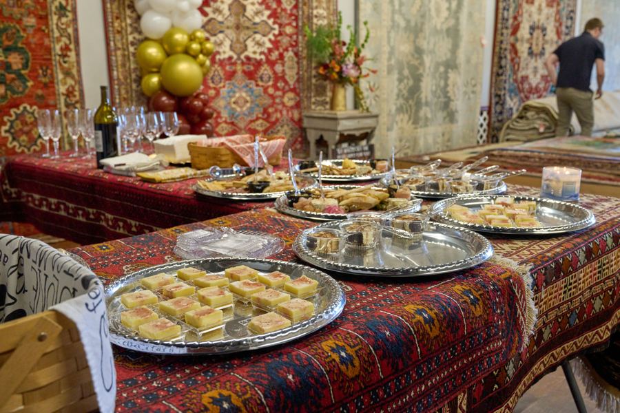 Anniversary spread served on a hand-knotted rug