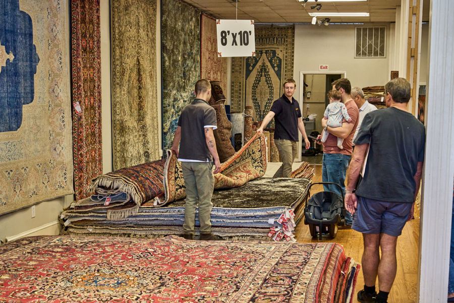 Rugs turned back for guests to compare